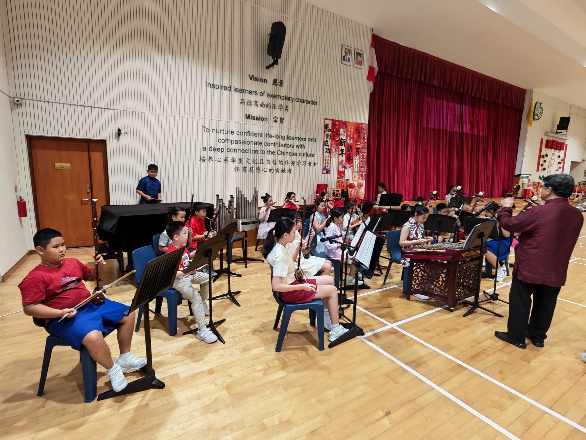 Maha Bodhi School Chinese Orchestra performing during Chinese New Year Celebration.